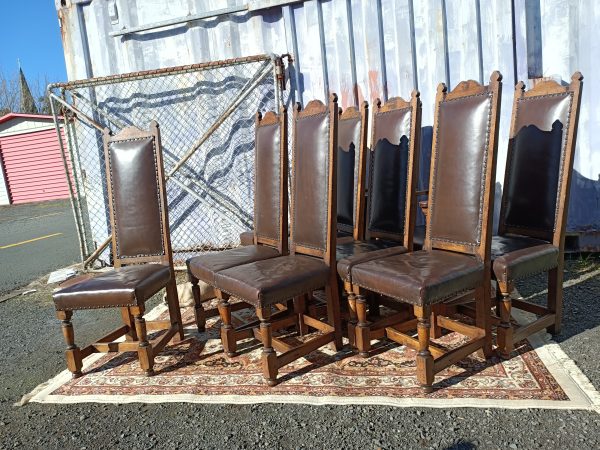 A set of ten oak dining chairs